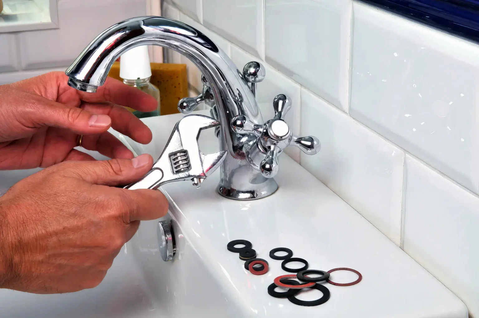 Plumber maintaining a bathroom faucet in Santa Clara