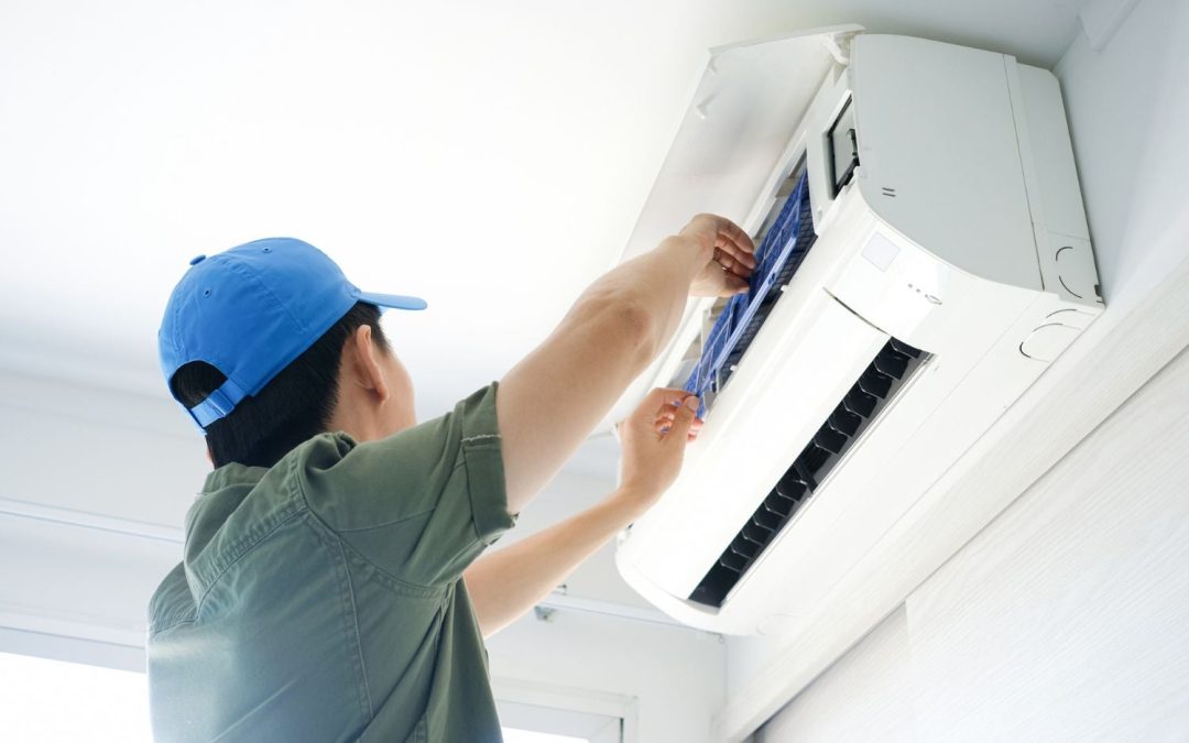 HVAC technician servicing a ductless mini split in Santa Clara